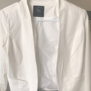 Trendy white blazer